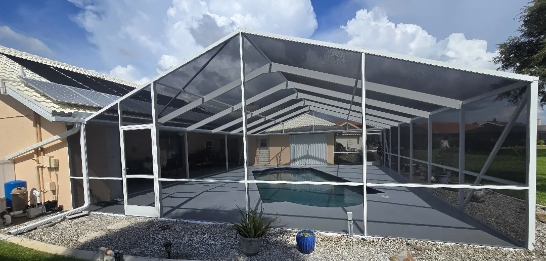 The same pool cage after restoration, refinished frame and new screen on every panel